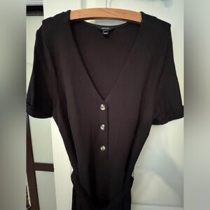 Ladies jumpsuit, horn buttons, self belt. Very elegant, have short sleeves .